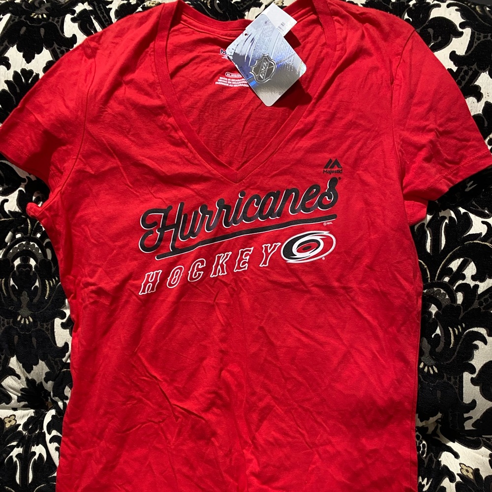 New with Tags. Women’s Hurricanes Hockey T-shirt. Size XL.